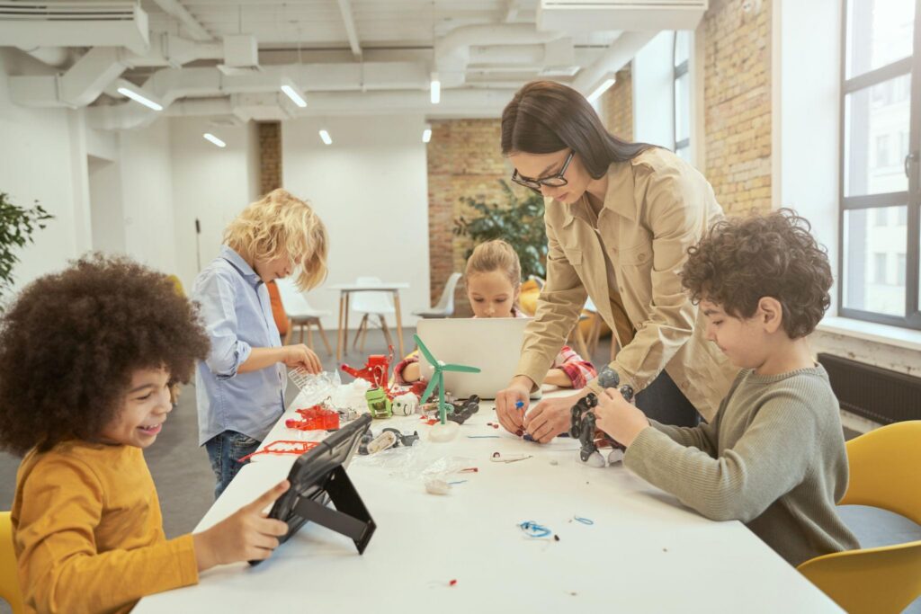 Students building robotics projects during a school STEM fundraiser campaign